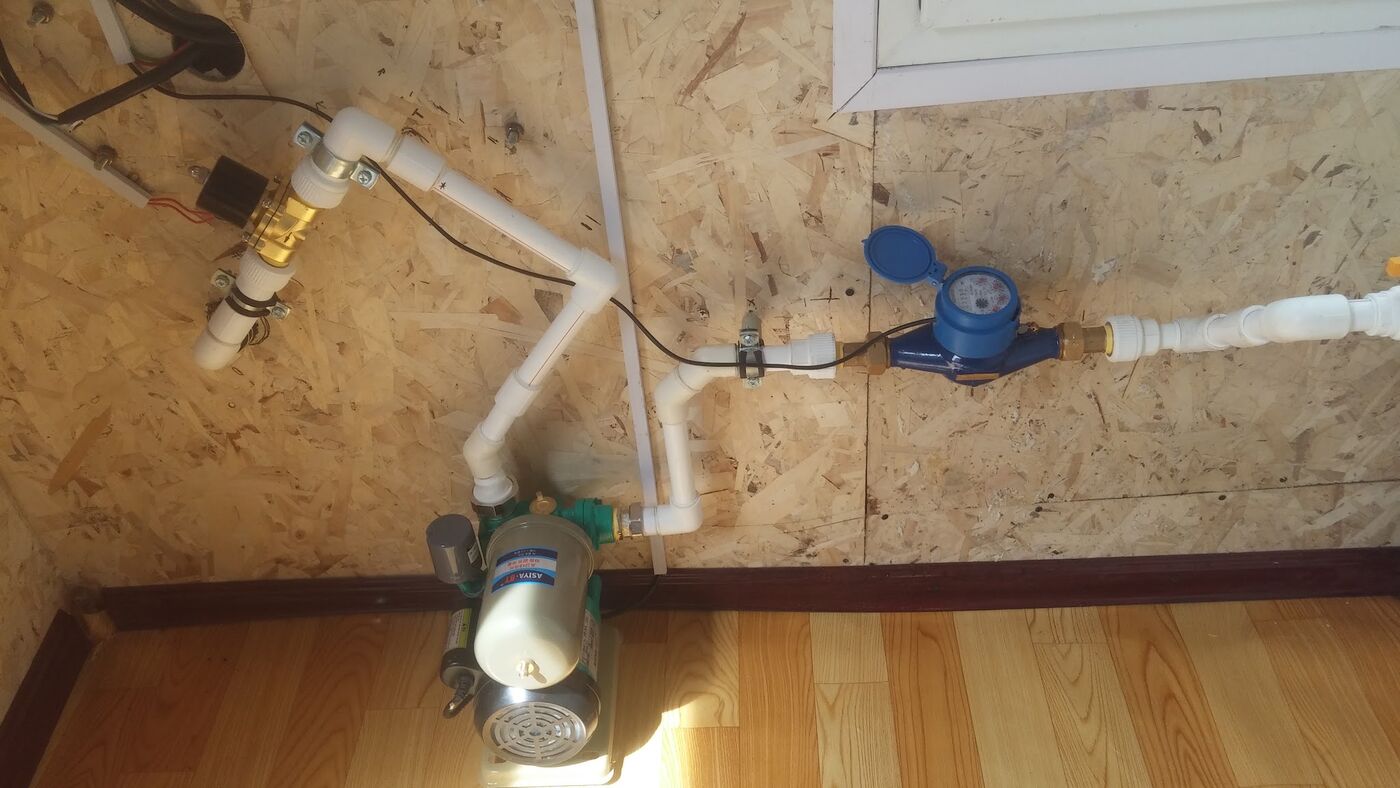 Pump, meter and solenoid valve installed inside a well house